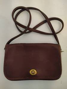 lot 109 image: Coach Small Leather Flap Purse
