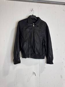 lot 2275 image: Wilsons Black Leather Jacket LARGE