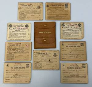 lot 54 image: Vintage United States Of America War Ration Book With Stamps And Leather Holder