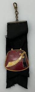 lot 164 image: Antique 1908 Shriners Pin With Inscription On Back