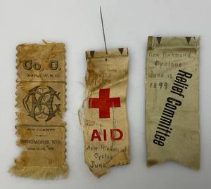 lot 169 image: Misc. Vintage Collectible Ribbons Including 1899 New Richmond Cyclone Relief Committee, Red Cross Aid And More