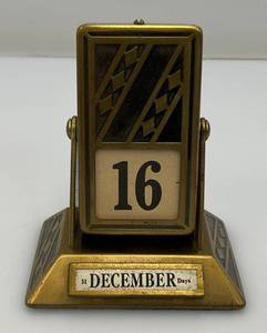lot 210 image: Vintage JE Mercott Perpetual Desk Calendar