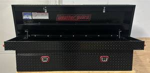 lot 1 image: Weather Guard 72in. Saddle Truck Box, Gloss Black, Model# 127-5-04 #5864924 Msrp $1,204.00