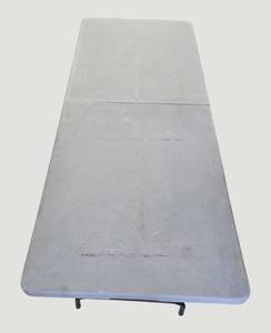 lot 88 image: Discover the perfect solution for your special events with our 6-foot extra-long folding table