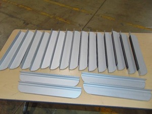 lot 55 image: 19 Piece Lot of Magnetic Shelves 2 12 x 15 - Aluminum