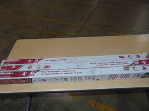 lot 56 image: 3 Pack Metalux 4 Ft snf132rc Garage Lights
