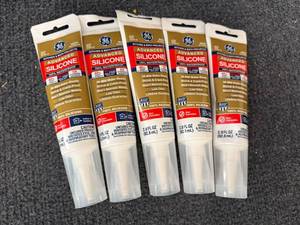 lot 73 image: 6 Tubes Of Ge White Silicone