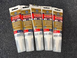 lot 74 image: 6 Tubes Of Ge White Silicone