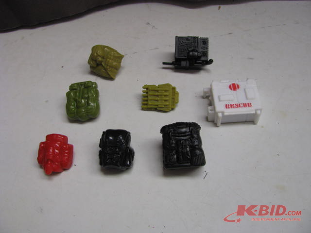 lot 36 image: action figure back packs
