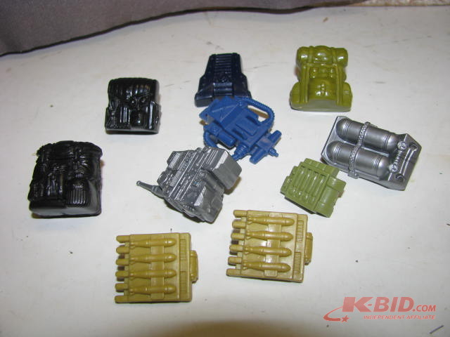lot 37 image: back pack and weapons for action figures