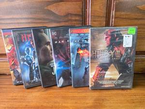 lot 53 image: 6 DVDs Superman, Hellboy, Dark Knight, Man of Steel, Joker, Hellboy 2, SpiderMan