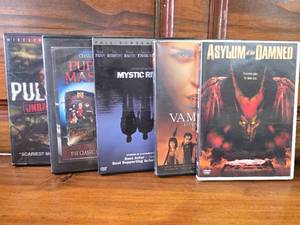 lot 56 image: Horror DVDs Asylum of the Damned, Vampires Los Muertos, Mystic River, Puppet Master, Pulse