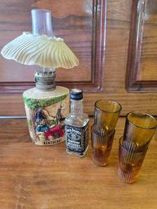 lot 90 image: Small Oil Lamp, 4 Tiny Shot Glasses and A Small Jack Daniels Bottle