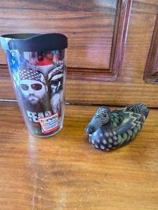 lot 101 image: Hand-Carved Duck and Tervis Mug