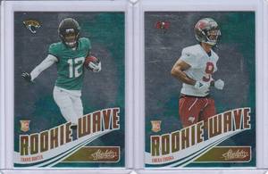 lot 82 image: 2025 Panini Absolute Rookie Wave - Travis Hunter #RW-THR, Emeka Egbuka - #RW-EEA