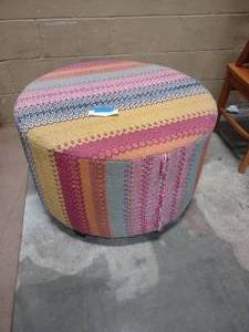 lot 1 image: Striped round ottoman