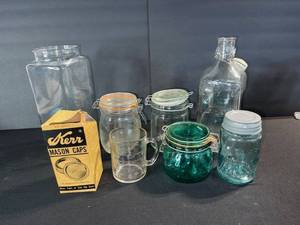 lot 78 image: Kerr Mason Caps - One Dozen Box & Glass Mason Jars Assorted