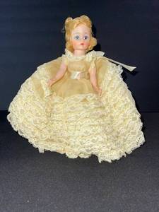 lot 94 image: Madame Alexander Melanie Doll - Vintage Cream Lace Dress with Pink Rose Belt
