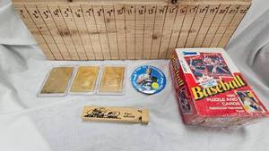 lot 27 image: Unopened Don Russ 1990 Puzzles and Cards, 23kt Foil Cards Nolan Ryan, Mark McGwire,