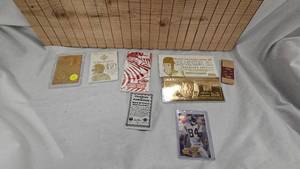 lot 28 image: 23kt Gold Foil McGwire, Joe Montana, Dan Marino, Cal Ripkin Jr, and Randy Moss Card