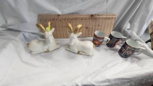 lot 45 image: Pair of Fitz and Floyd Porcelain Rams