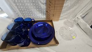lot 9 image: 4 Blue Glasses, 2 Blue glass Cups, Dessert and Dinner Plates, Clear Glass and Bowl
