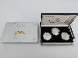lot 138 image: United States Mint American Eagle 20th Anniversary Silver Coin Set - 3-Coin Display