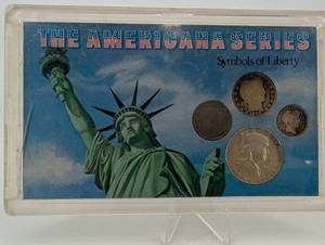 lot 157 image: The Americanana Series Symbols of Liberty Coin Card - 4 U.S. Coins