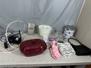 lot 35 image: Pampered Chef Casserole, Internet Modem, Purses, Housewares