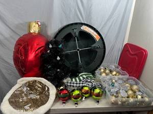 lot 27 image: Large Christmas Tress Stand, Stocking Hangers, Ornaments, Tree Skirts, and More