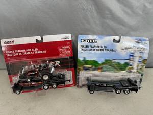 lot 105 image: 2 New Ertl Case IH Tractor Pulling Toy Sets