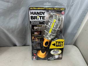 lot 181 image: New Handy Brite Ultra Bright Cordless Work Light