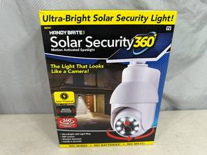 lot 213 image: New Solar Security 360 Motion Activated Spotlight - Looks like Camera