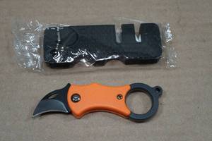 lot 67 image: Mini Eagle Claw Folding Knife and Sharpener