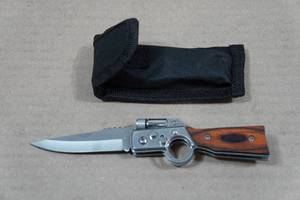 lot 68 image: Gun Shaped Folding Knife