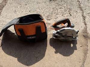 lot 27 image: RIDGID Circular Saw with OrangeBlack Carry Bag