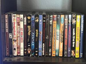 lot 41 image: DVDs - Mixed Movie Titles Collection on Shelf
