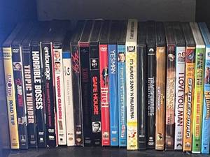lot 42 image: Assorted Comedy & Action DVD Collection - Shelf of Popular Titles