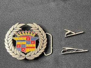 lot 66 image: Cadillac Coat of Arms Belt Buckle - Laurel Wreath Silver Tone & 2 Silver Tone Tie Clips