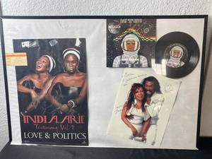 lot 80 image: India.Arie Love & Politics Autographed Framed Poster Collage - Testimony Vol 2 & Day N Nite Vinyl