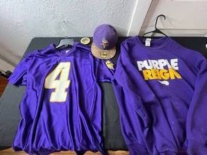 lot 81 image: NFL Team Apparel Minnesota Vikings Fan Gear - Favre #4 Favre Jersey, Purple Reign Shirt, Cap & Vikings Ornament