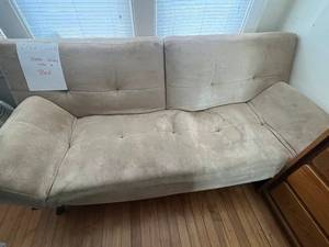 lot 91 image: Click-Clack Sofa Bed - Beige Tufted Upholstered Couch