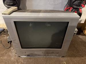 lot 119 image: Memorex 20-Inch CRT TV With Built-In VHS & DVD Player, Remote