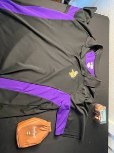 lot 132 image: Minnesota Vikings NFL Team Apparel Jacket 2XL Black with Purple Accents & Vikings Salt & Pepper Shakers