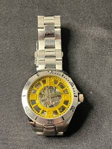 lot 146 image: STUHRLING ORIGINAL Skeleton Watch - Yellow Dial, Stainless Steel - unauthenticated