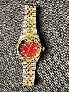 lot 147 image: Replica Rolex Day-Date Gold Tone & Stainless Steel Two-Tone Watch - Red Dial