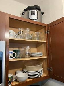 lot 162 image: Instant Pot Electric Pressure Cooker & Glassware & Dishes