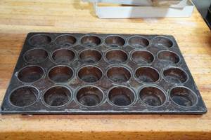 lot 127 image: 15 Cupcake Baking Sheets - 24 Count