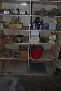 lot 921 image: Contents of Wooden Shelf - Electrical Wire, Outlets, WD40