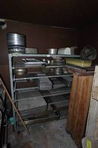 lot 930 image: Industrial Rolling Shelf with Large Assortment of Cake and Bread Pans